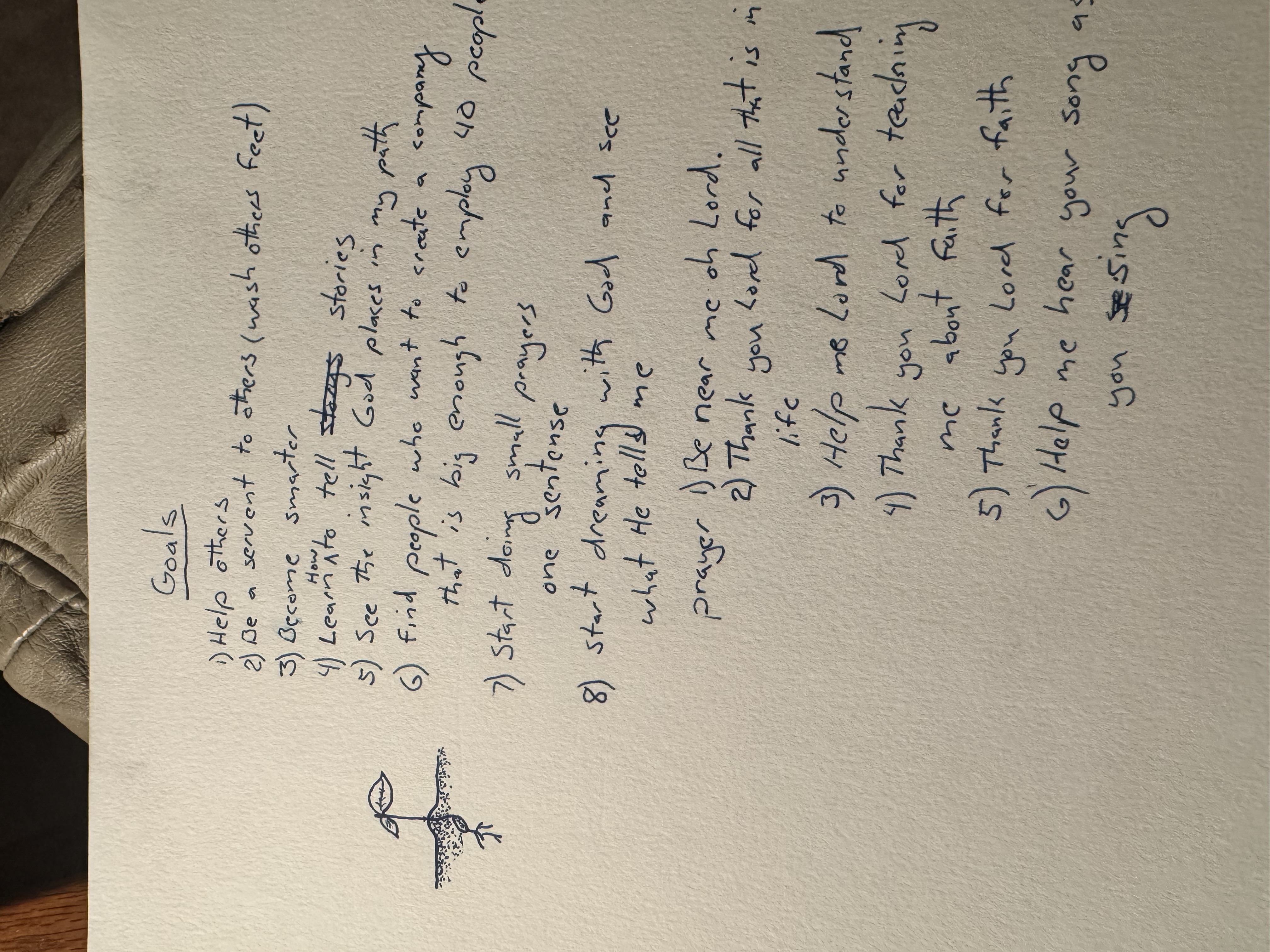 A handwritten journal page titled Goals, containing personal goals and prayers with a small drawing of a growing seed